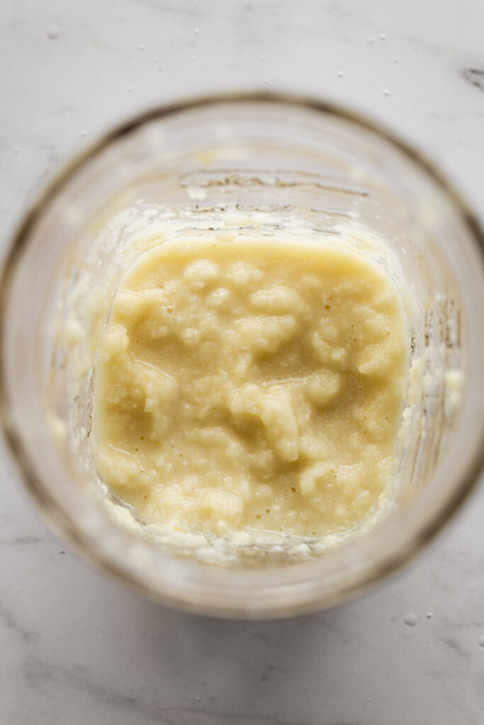 Jar filled with garlic paste