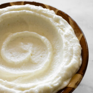 Toum swirled in a traditional Lebanese bowl