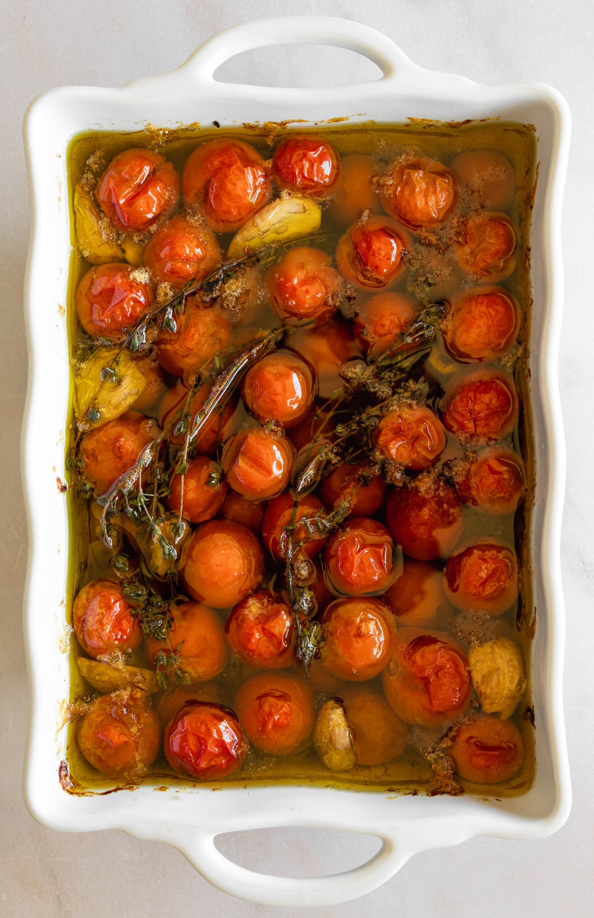 tomato confit in a baking dish after slow roasting for two and a half hours.
