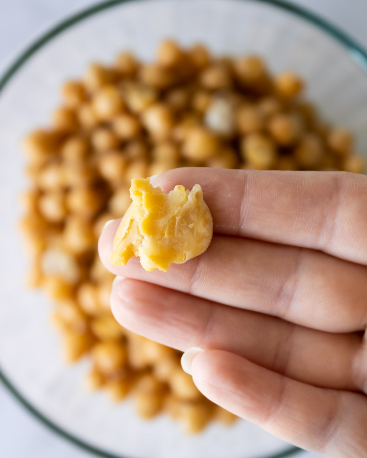 mashed chickpea in between fingers.